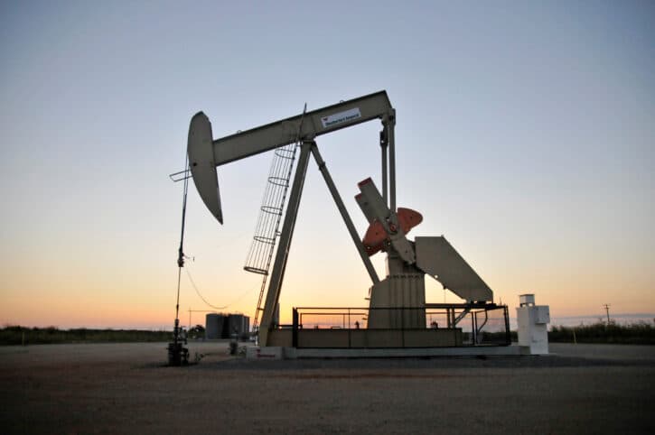 FILE PHOTO: A pump jack operates at a well site leased by Devon Energy Production Company near Guthrie, Oklahoma