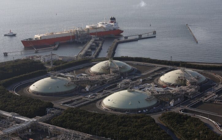 File photo of liquefied natural gas storage tanks and a membrane-type tanker at Tokyo Electric Power Co.’s Futtsu Thermal Power Station in Futtsu